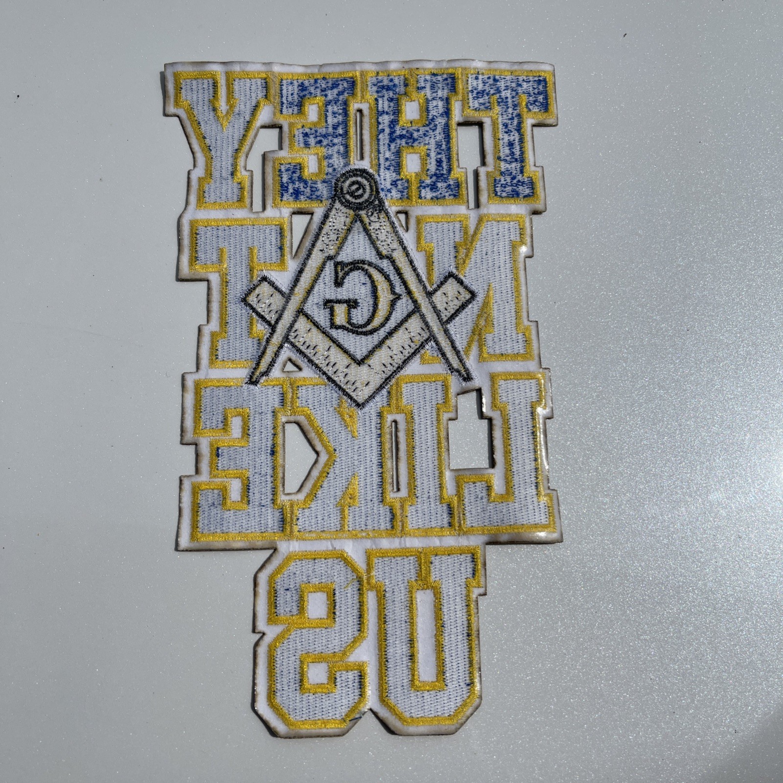 Masonic gold & blue patch 6×20”. “THEY NOT LIKE US”