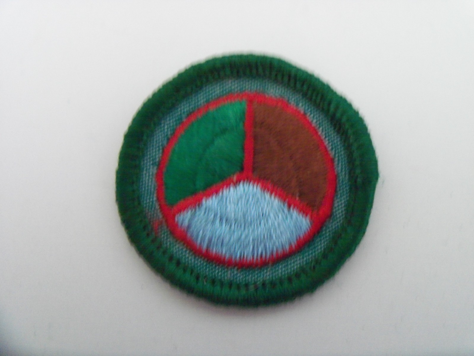 Girl Scout Badge: Conservation, cheesecloth backing